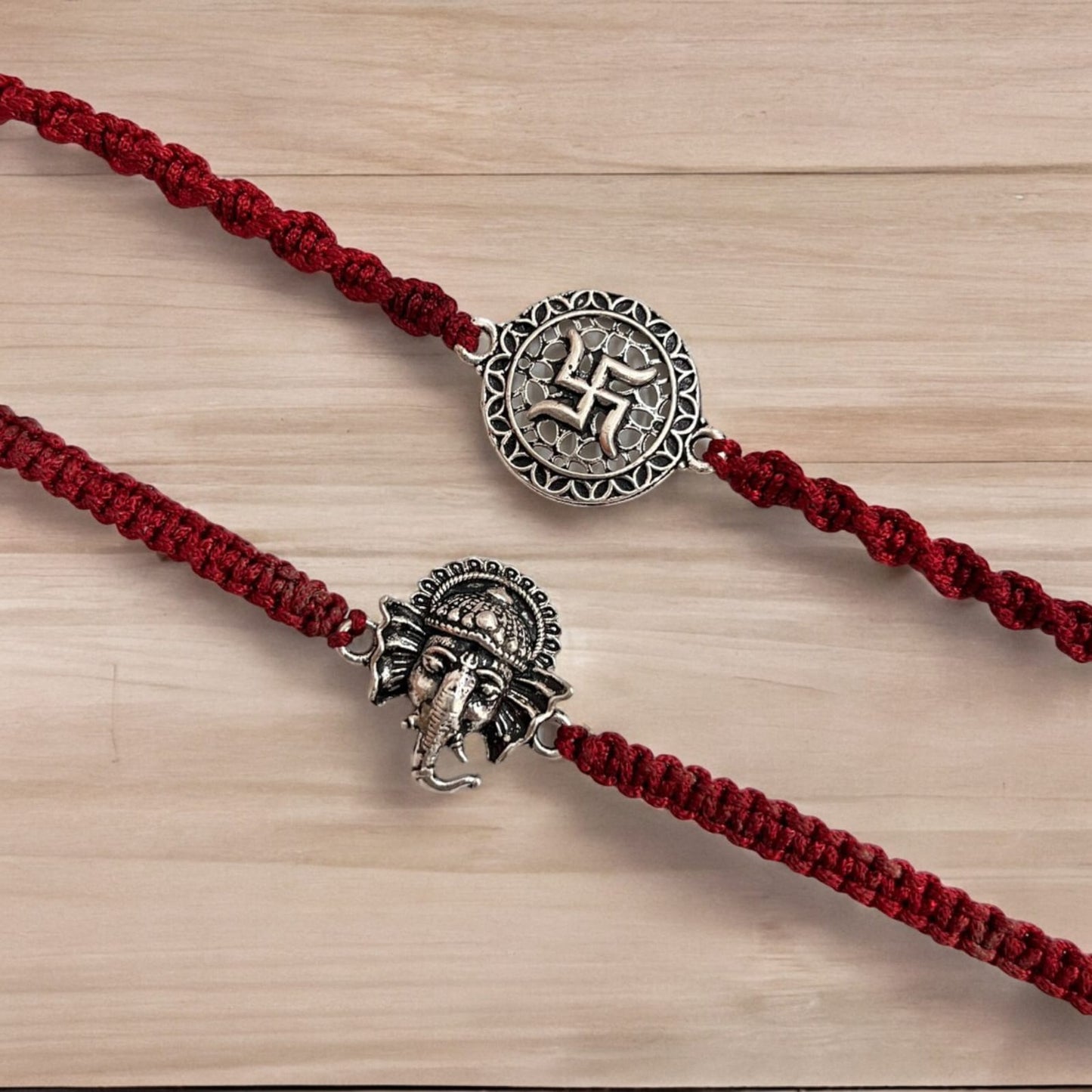 925 Sterling Silver Oxidised Swastik and Ganesha Face Rakhi For Brother Set Of 2